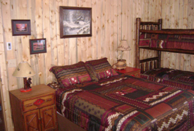 One of the bedrooms on the first floor of the cabin